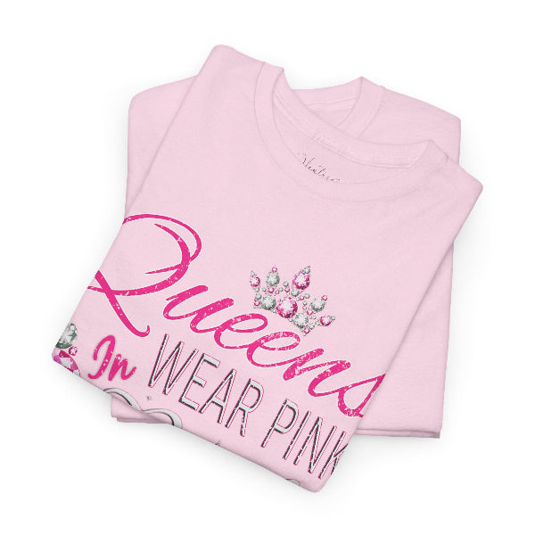 Folded pink t-shirt with 'Queens Wear Pink' text on a white background