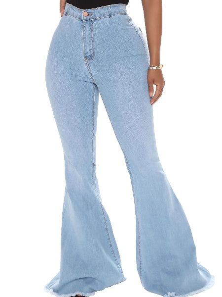 Light blue flared jeans worn by a person on a white background