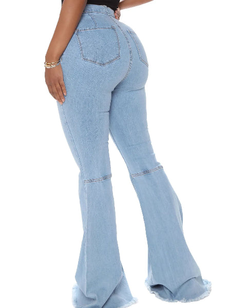 Light blue flared jeans on a white background