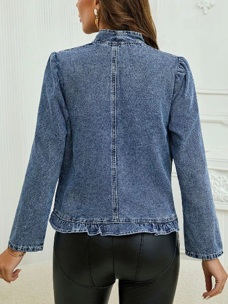 Blue denim jacket worn by a person on a white background