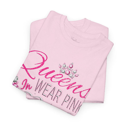 Folded pink t-shirt with 'Queens Wear Pink' text on a white background