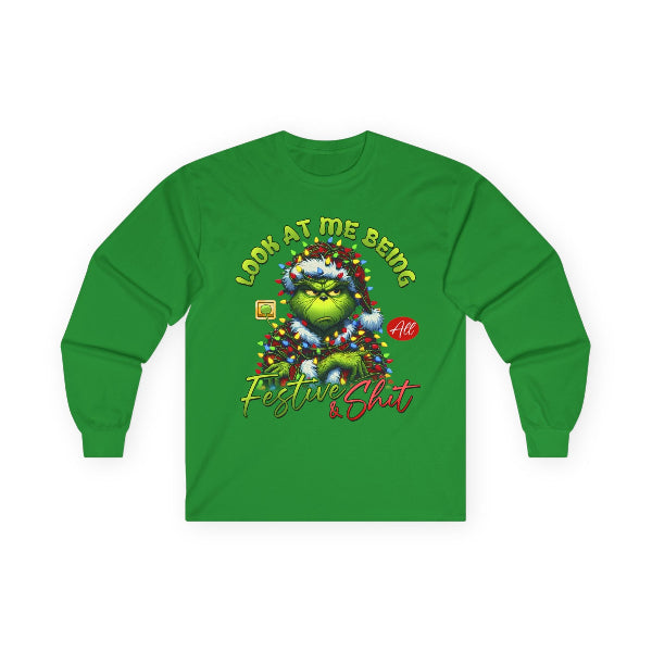 Green long-sleeve shirt with festive graphic design on a white background