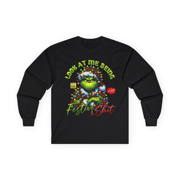 Black long-sleeve shirt with a festive design featuring a character wrapped in lights on a white background.