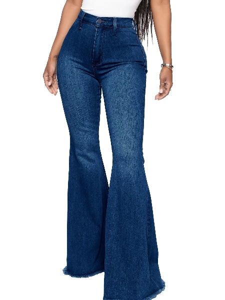 Blue flared jeans worn by a person on a white background