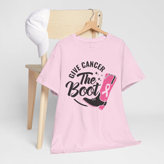 Pink t-shirt with 'Give Cancer the Boot' text and pink ribbon graphic on a wooden chair.
