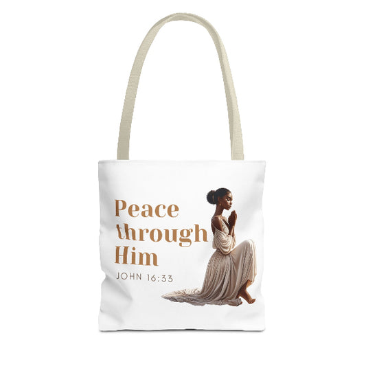 Tote bag with a woman praying and 'Peace through Him' text on a white background